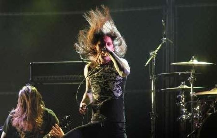 Singer Tim Lambesis of As I Lay Dying performs at the 2nd annual Golden Gods awards in Los Angeles April 8, 2010.
