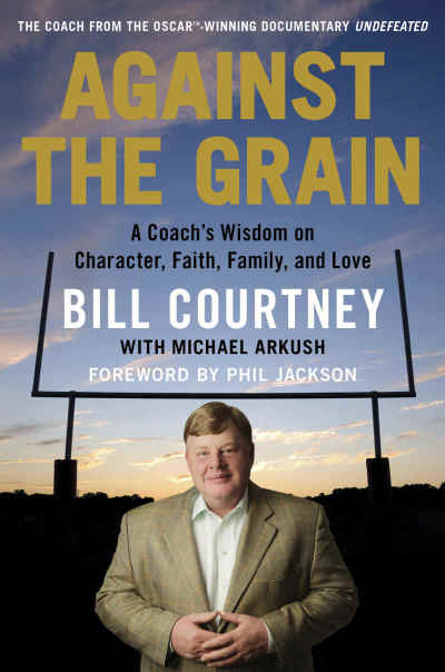 This image shows the cover of the May 2014 book, 'Against the Grain: A Coach's Wisdom on Character, Faith, Family, and Love' by Bill Courtney and Michael Arkush.