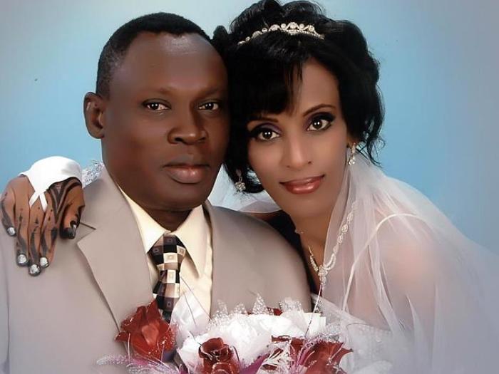 Daniel Wani (l) with his wife Meriam Yehya Ibrahim, 27, (r) who was sentenced to death for refusing to renounce her Christian faith