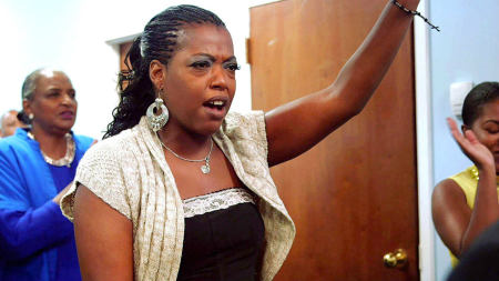 This image shows a scene from a trailer for "Fighting Satan" from "Our America with Lisa Ling."