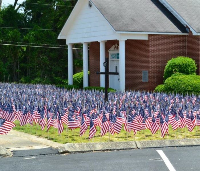 Grace Place Church of Enterprise, Alabama placed 6,809 American flags on their property during Memorial Day Weekend 2014 in memory of the 6,809 Americans killed in Iraq and Afghanistan since 2003.