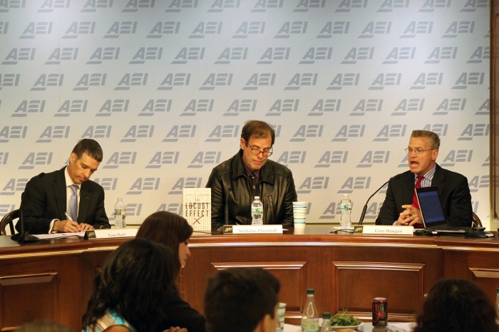 Gary Haugen (far right), president, CEO and founder of International Justice Mission, speaking about his new book, The Locust Effect: Why the End of Poverty Requires the End of Violence, with Tom Hart (left), U.S. executive director of the ONE Campaign, and AEI scholar Nicholas Eberstadt (middle), at the American Enterprise Institute, Washington, D.C., May 28, 2014.