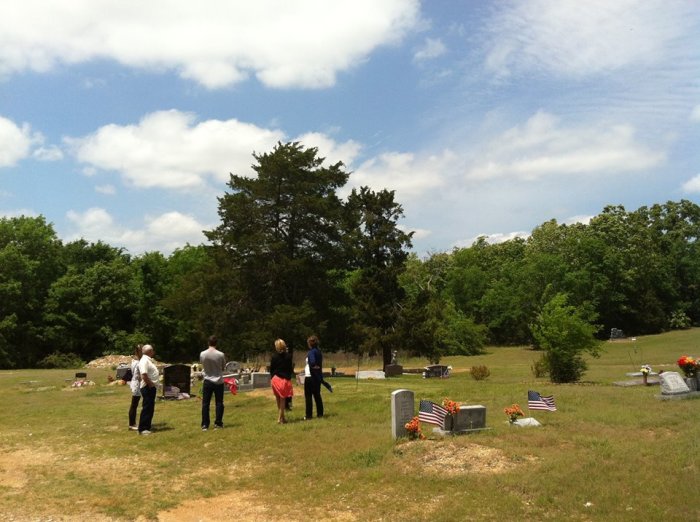 Family members visit the grave of US Navy SEAL Adam Brown