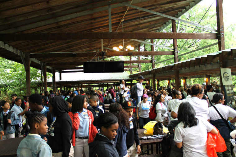 Volunteers attempt to organize students in attendance at the Bronx Zoo in the Bronx borough of New York City on Thursday, June 5, 2014, as part of Joel Osteen Miniseries's Generation Hope Project outreach.