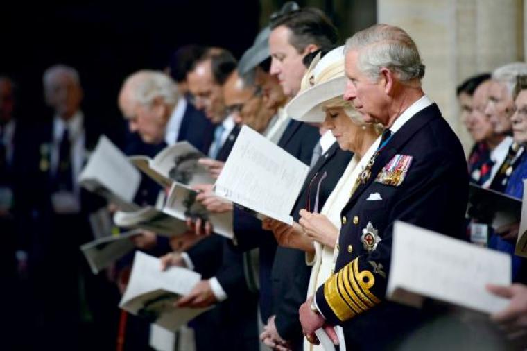 Britain's Prince Charles, Prince of Wales, his wife Camilla, the Duchess of Cornwall, and British Prime Minister David Cameron listen to the service during a British D-Day commemoration ceremony at the Bayeux Cathedral in Bayeux, June 6, 2014.