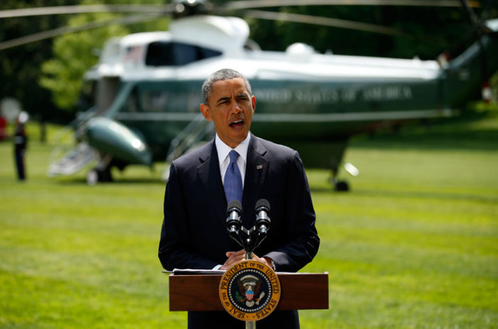 U.S. President Barack Obama speaks about the situation in Iraq from the South Lawn of the White House in Washington June 13, 2014. Obama said on Friday he will take several days to review options for how the United States can help Iraq deal with a militant insurgency, saying any action would need significant involvement by Iraq itself.