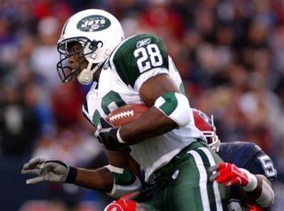 New York Jets running back Curtis Martin rips off a long gain against the Buffalo Bills during NFL action at Ralph Wilson Stadium in Orchard Park, New York, Oct. 16, 2005 file photo