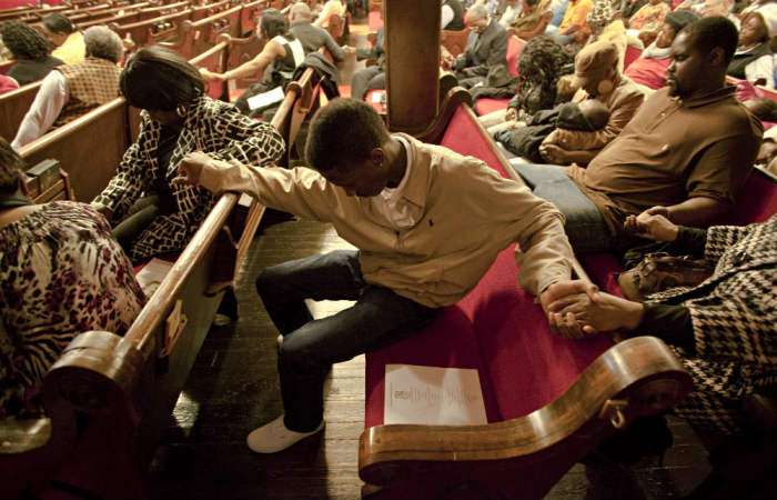 Parishioners worship at a predominantly African-American church in this file photo.
