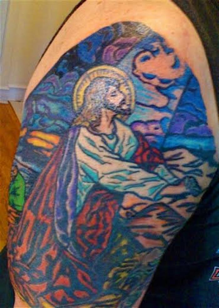 Faith-inspired tattoos make up a portion of tattoo artist Ron Hendon's business.