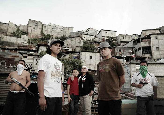 The documentary 'BBoy for Life' by Nadus Films chronicles how some navigate and escape the violent gang life in Guatemala City. Appearing in this photo are the main characters to the film, from left to right: an unnamed gangster, B-boy Gato, Leidy's son Gerald, Leidy, B-boy Cheez and another unnamed gangster.