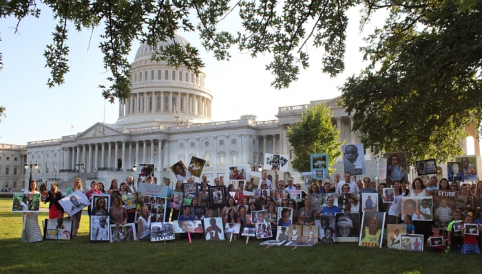 Candlelight vigil for adoptive parents of children stuck in the Democratic Republic of Congo, organized by Both Ends Burning, Washington, D.C., June 24, 2014.