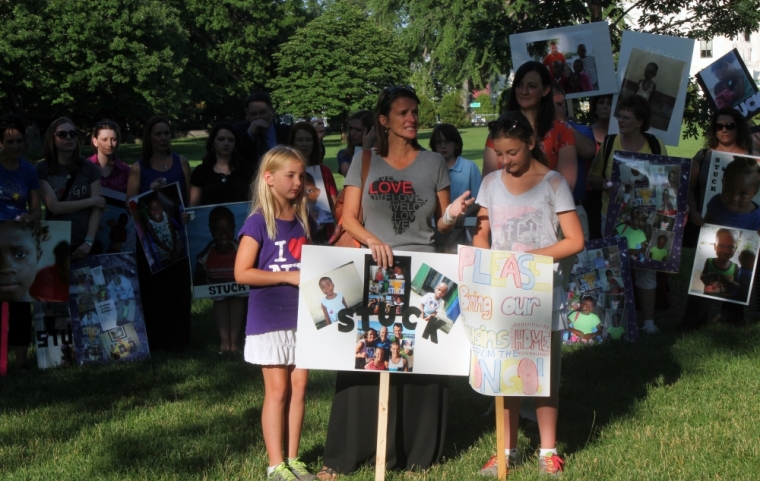 Candlelight vigil for adoptive parents of children stuck in the Democratic Republic of Congo, organized by Both Ends Burning, Washington, D.C., June 24, 2014.