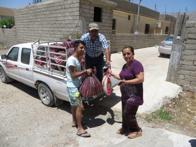 Delivery of Open Doors food items to an Iraqi refugee in Northern Iraq in June 2014.