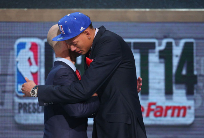 Isaiah Austin (Baylor) hugs NBA commissioner Adam Silver after being selected as an honorary draft pick by the NBA during the 2014 NBA Draft at the Barclays Center. Austin was diagnosed with Marfan Syndrome ending his career.