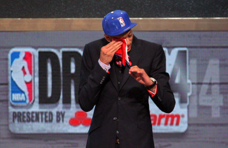 Isaiah Austin (Baylor) wipes a tear from his eye after being selected as an honorary draft pick by the NBA during the 2014 NBA Draft at the Barclays Center. Austin was diagnosed with Marfan Syndrome ending his career.