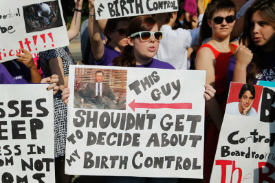 Pro-abortion and birth control protesters demonstrate outside the U.S. Supreme Court in Washington June 30, 2014.