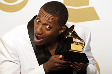 Lecrae poses with his Grammy award for Best Gospel Album for "Gravity" backstage at the 55th annual Grammy Awards in Los Angeles, California, Feb. 10, 2013.