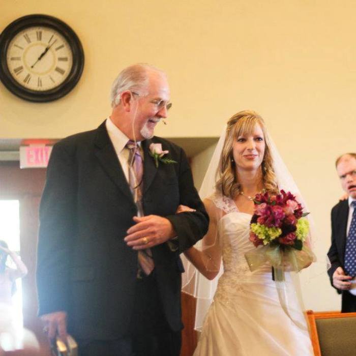Pastor John Warden, 59, (l) and his daughter Marissa Priddy (l) at her wedding to Jared Priddy who went on to accidentally kill him.
