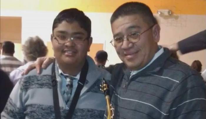 Jose Armando Siliezar-Sevilla, 48, (right) with his son. Siliezar-Sevilla was arrested at his home by Immigration and Customs Enforcement agents on June 3 for lying on an application to adjust his immigration status.