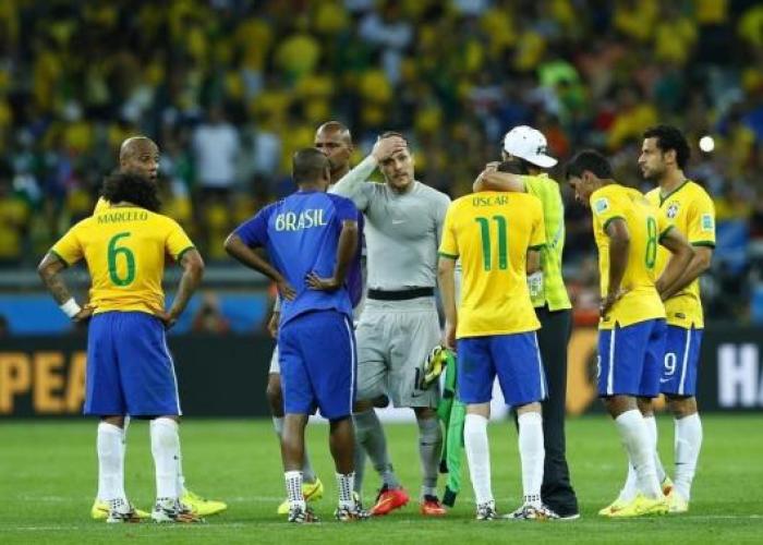 Brazil players react after the 2014 World Cup semi-finals between Brazil and Germany at the Mineirao stadium in Belo Horizonte July 8, 2014.