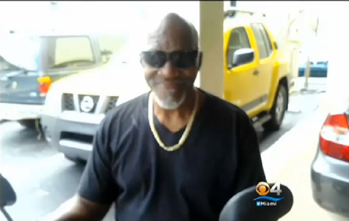 Pastor Kenneth Johnson was killed for the fake gold chain he is pictured wearing around his neck.