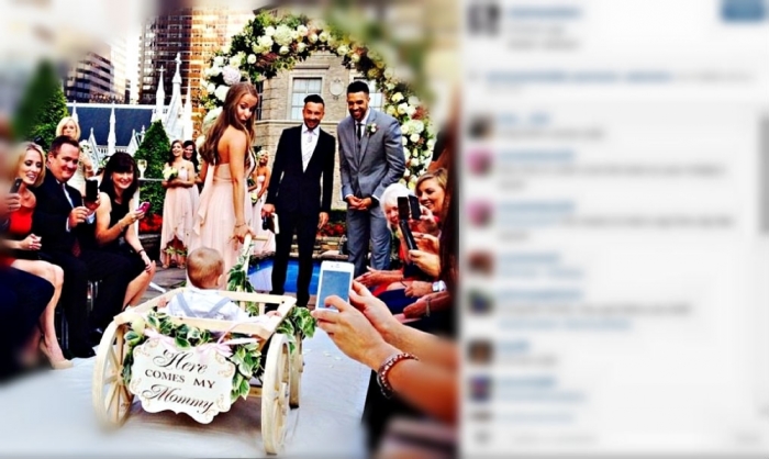 Landry Fields and Elaine Alden's wedding ceremony is seen in this photo shared publicly online July 13, 2014.
