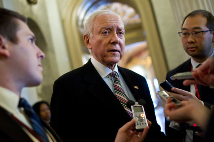Senator Orrin Hatch (R-UT) talks to reporters during a series of votes in Washington December 17, 2011. The U.S. Senate voted on Saturday to extend a payroll tax cut for two months in legislation that also attempts to force President Barack Obama to approve construction of an oil pipeline.