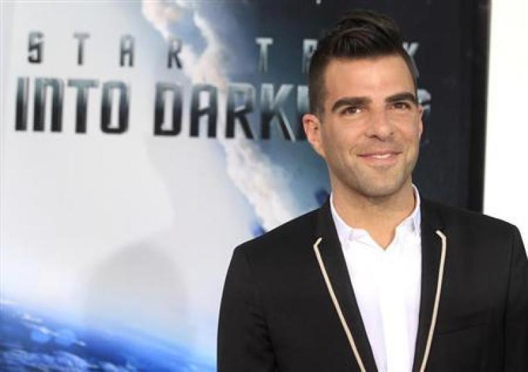 Actor Zachary Quinto, cast member of the new film ''Star Trek Into Darkness'', poses as he arrives at the film's premiere in Hollywood May 14, 2013.