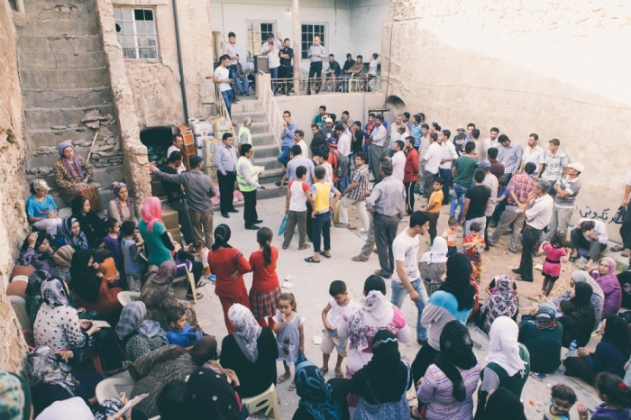 Distribution of items for refugees in Kurdistan, Iraq, in June 2014.
