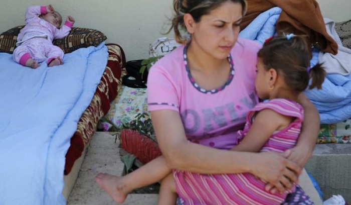 Christians in Mosul are fleeing the city after ultimatum from ISIS in July 2014.