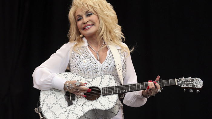 American country music star Dolly Parton performs on the Pyramid Stage at Worthy Farm in Somerset, during the Glastonbury Festival, June 29, 2014.