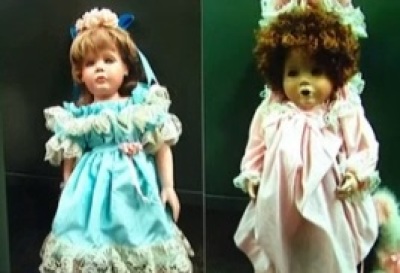 A photo of 2 dolls found in a San Clemente, California neighborhood that initially disturbed local residents, until they discovered a member of their church had left them as a sign of good will.