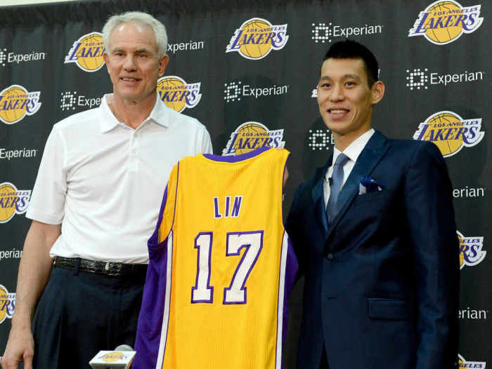 Los Angeles Lakers general manager Mitch Kupchak introduces Jeremy Lin during a press conference at Toyota Sports Center in El Segundo, California, Thursday, July 24, 2014.