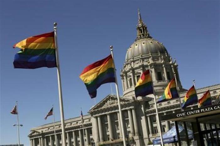 Rainbow colored flags fly outside City Hall in San Francisco, California, June 28, 2013.