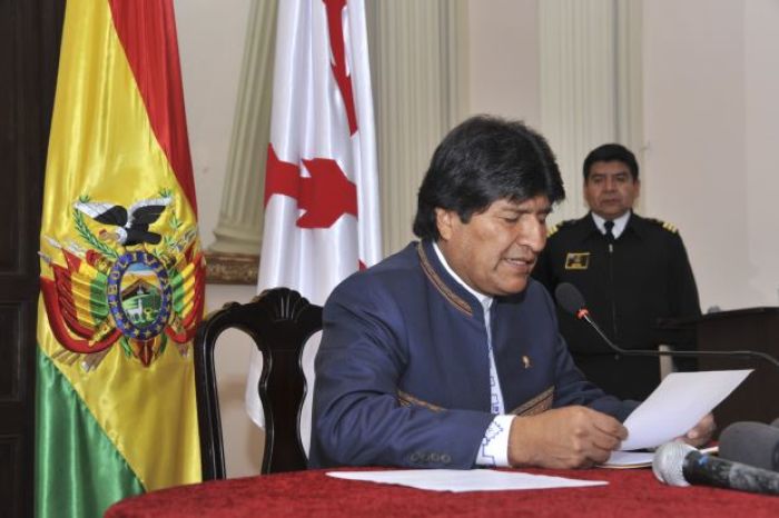Bolivia's President Evo Morales reads an official statement during a news conference in Sucre in this July 8, 2014 handout picture.