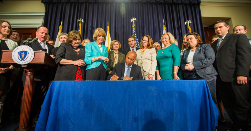Deval Patrick, governor of Massachusetts, signing "An Act to Promote Public Safety and Protect Access to Reproductive Health Care Facilities" at the State House on Wednesday, July 30, 2014.