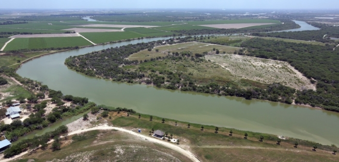 The bend in the Rio Grande is seen from a Texas Department of Public Safety (DPS) helicopter on patrol in Mission, Texas, on July 24, 2014. The DPS is fighting an uphill battle in the war against smuggling on the Rio Grande river at the U.S.-Mexico border in southern Texas.
