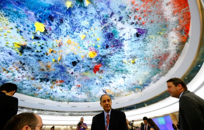 Israel's Ambassador to the U.N. Eviatar Manor (C) arrives for the 21st Special Session of the Human Rights Council on the human rights situation in the Palestinian Territories at the United Nations Office in Geneva July 23, 2014.