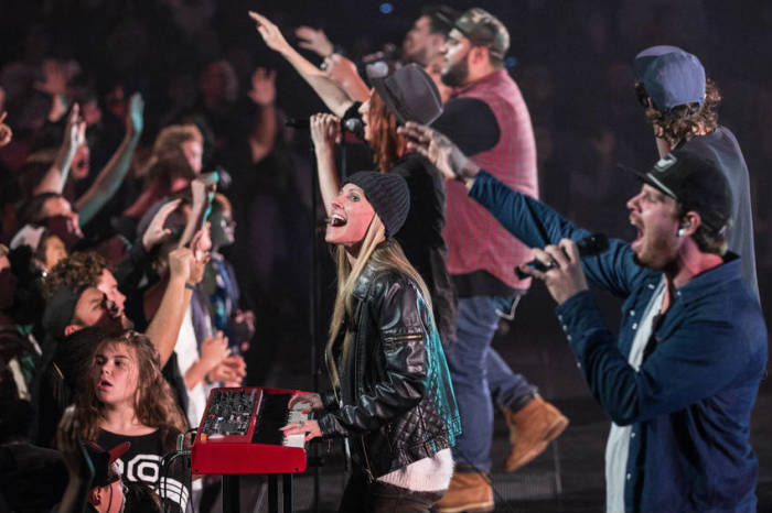 Autumn Hardman (C), Worship Oversight for Hillsong Church's Australian Campuses, is seen helping to lead worship in this undated photo.