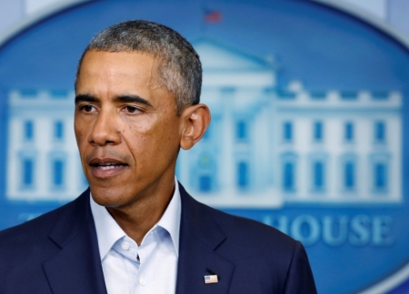 U.S. President Barack Obama speaks about developments in Iraq and civil unrest in Ferguson, Missouri, from the White House in Washington, Aug. 18, 2014.