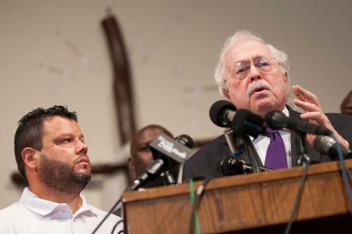 Dr. Michael Baden (R) and Prof. Shawn Parcells respond to questions from the media on August 18, 2014. The family of Michael Brown, a teenager shot dead by a police officer in Ferguson, Missouri, paid for an independent autopsy which was carried out by Dr. Michael Baden, former chief medical examiner for the City of New York.