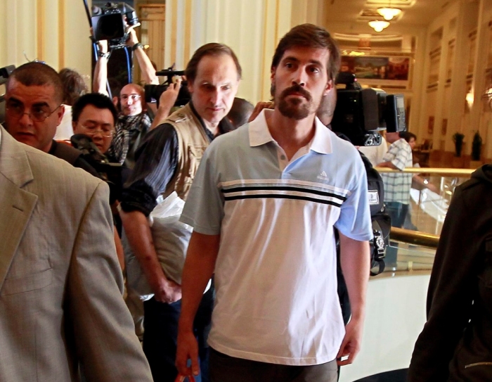 U.S. journalist James Foley (R) arrives with fellow reporter Clare Gillis (not pictured), after being released by the Libyan government, at Rixos hotel in Tripoli, Libya, in this picture taken May 18, 2011. Islamic State terrorists have posted a video that purported to show the beheading of American journalist Foley in revenge for U.S. air strikes in Iraq, prompting widespread revulsion that could push Western powers into further action against the group. Foley, 40, was kidnapped on Nov. 22, 2012, in northern Syria, according to GlobalPost. The video was posted after the U.S. resumed air strikes in Iraq in August for the first time since the end of the U.S. occupation in 2011. He had earlier been kidnapped and released in Libya. Picture taken May 18, 2011.