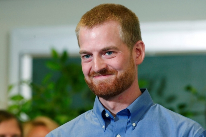 Dr. Kent Brantly, who contracted the deadly Ebola virus, smiles during a press conference at Emory University Hospital in Atlanta, Georgia, Aug. 21, 2014. The American doctor along with a second American aid worker who contracted Ebola treating victims of the deadly virus in Liberia have recovered and were discharged by the Atlanta hospital that treated them with an experimental drug.