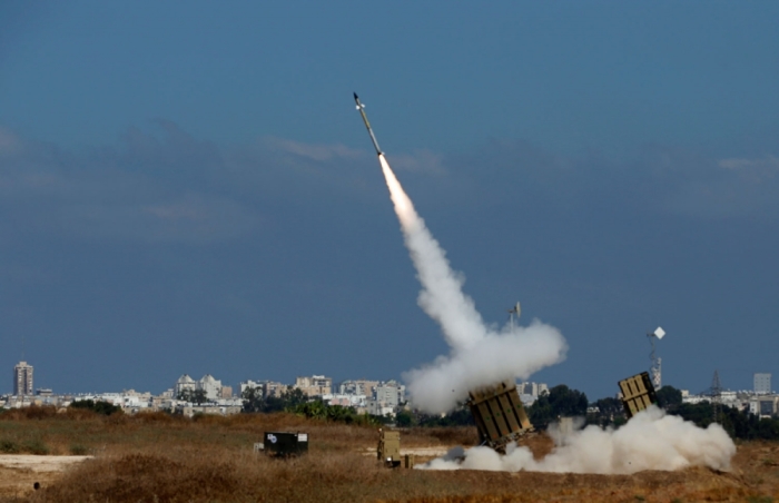 An Iron Dome launcher fires an interceptor rocket in the southern Israeli city of Ashdod July 9, 2014. At least two rockets fired from the Gaza Strip at Tel Aviv on Wednesday were shot down mid-air by Israel's Iron Dome defense system, the Israeli military said.