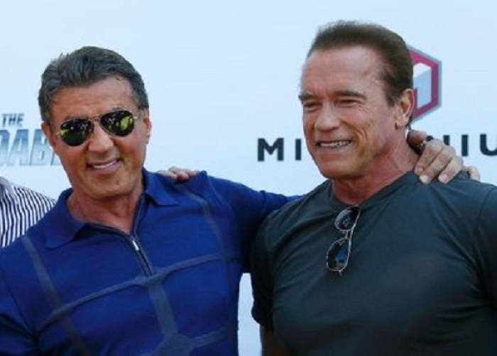 Sylvester Stallone (L) and Arnold Schwarzenegger in this undated photo.