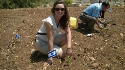 Chelsen Vicari, a Zionist, planting a tree in Israel.