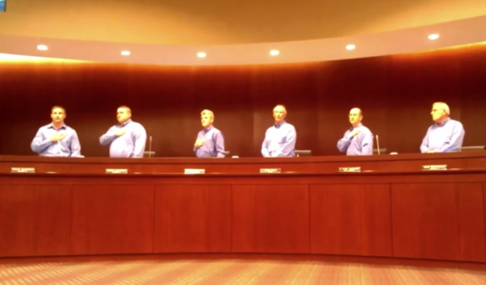 An atheist records the Winter Garden City Commissioners' meeting in August 2014 as Mayor John Rees demands that the recorder stand for the Pledge of Allegiance.