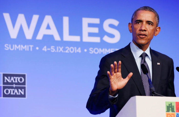 U.S. President Barack Obama talks at a news conference at the conclusion of the NATO Summit at the Celtic Manor Resort in Newport, Wales September 5, 2014.