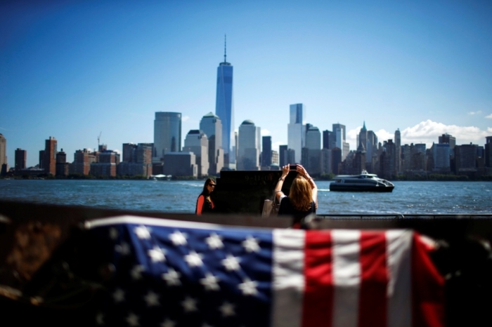 People visit the 9/11 memorial in Exchange Place, New Jersey, Sept. 10, 2014.