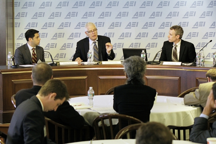 Victor Boutros (L) Richard Stearns, and Tom Walsh (R) discuss the importance of fighting for the less fortunate at the 2014 American Enterprise Institute's Evangelical Leadership Summit in Washington, Sept. 10, 2014